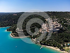 Aerial view on blue Lake of Serre-Poncon, reservoirÂ border Hautes-AlpesÂ andÂ Alpes-de-Haute ProvenceÂ departments,